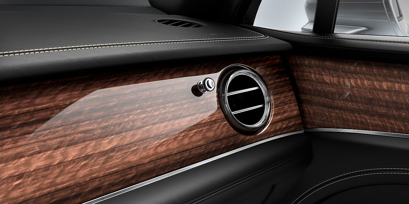 Bentley Shenzhen - Luohu Bentley Bentayga front interior Crown Cut Walnut veneer and chrome air vent.